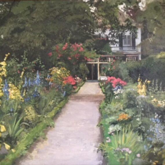 Achterzijde Huis Kolthoorn met tuin vol in bloei